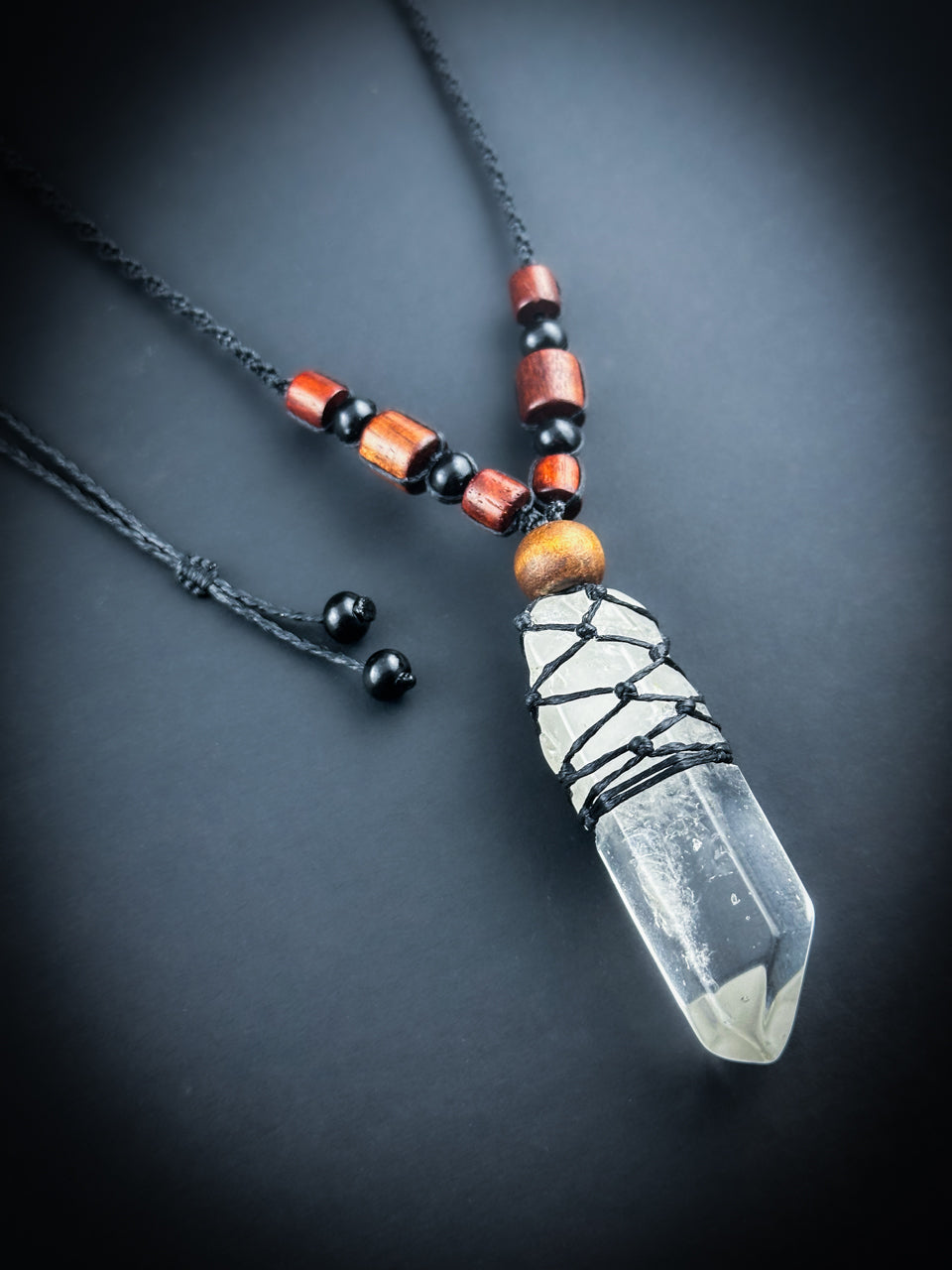 Clear Quartz point with natural rose wood beaded Necklace